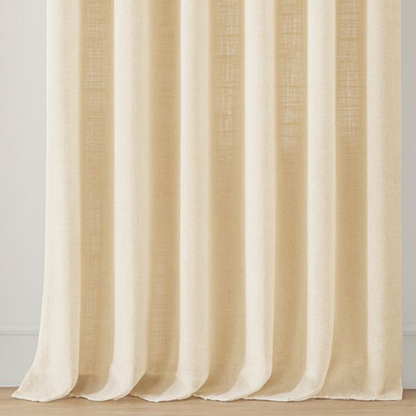 Curtain hem pooling softly on the floor